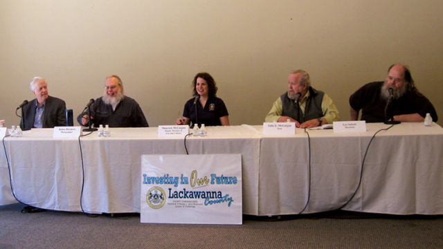 A panel called 'Dancing in the Kitchen: The Role of Music in Irish and Irish American Culture' studied the impact of traditional Irish music on identity, arts and culture in Ireland and the U.S. The panelists included: (from left) musician Brian Conway, photographer Robin Hiteshew, moderator Maureen McGuigan, poet John E. McGuigan and musician Leo Schott.