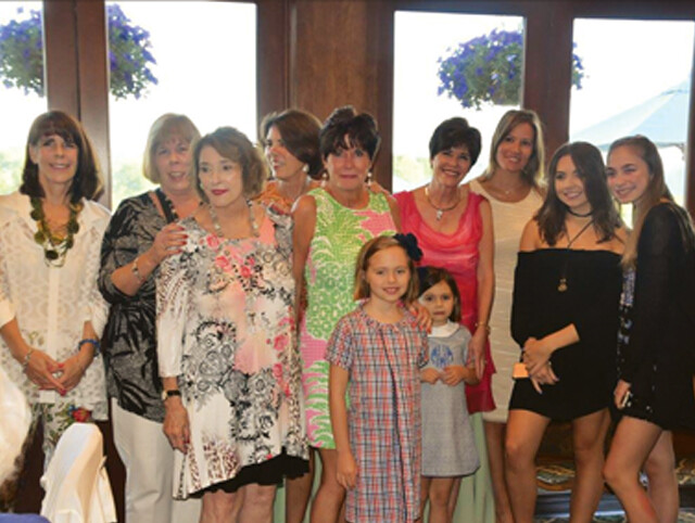 Kathy McGee Burns is with her two little granddaughters: Cate Brogan Wall, Molly McGee Wall; (Row 2) from left daughters Kelly Wall, Tierney Wall, Tracy Wall, Kathy Wall Lee and Kimberley Wall Meacham; and granddaughters from left Dera Lee, Elisabeth and Meredith Burns.